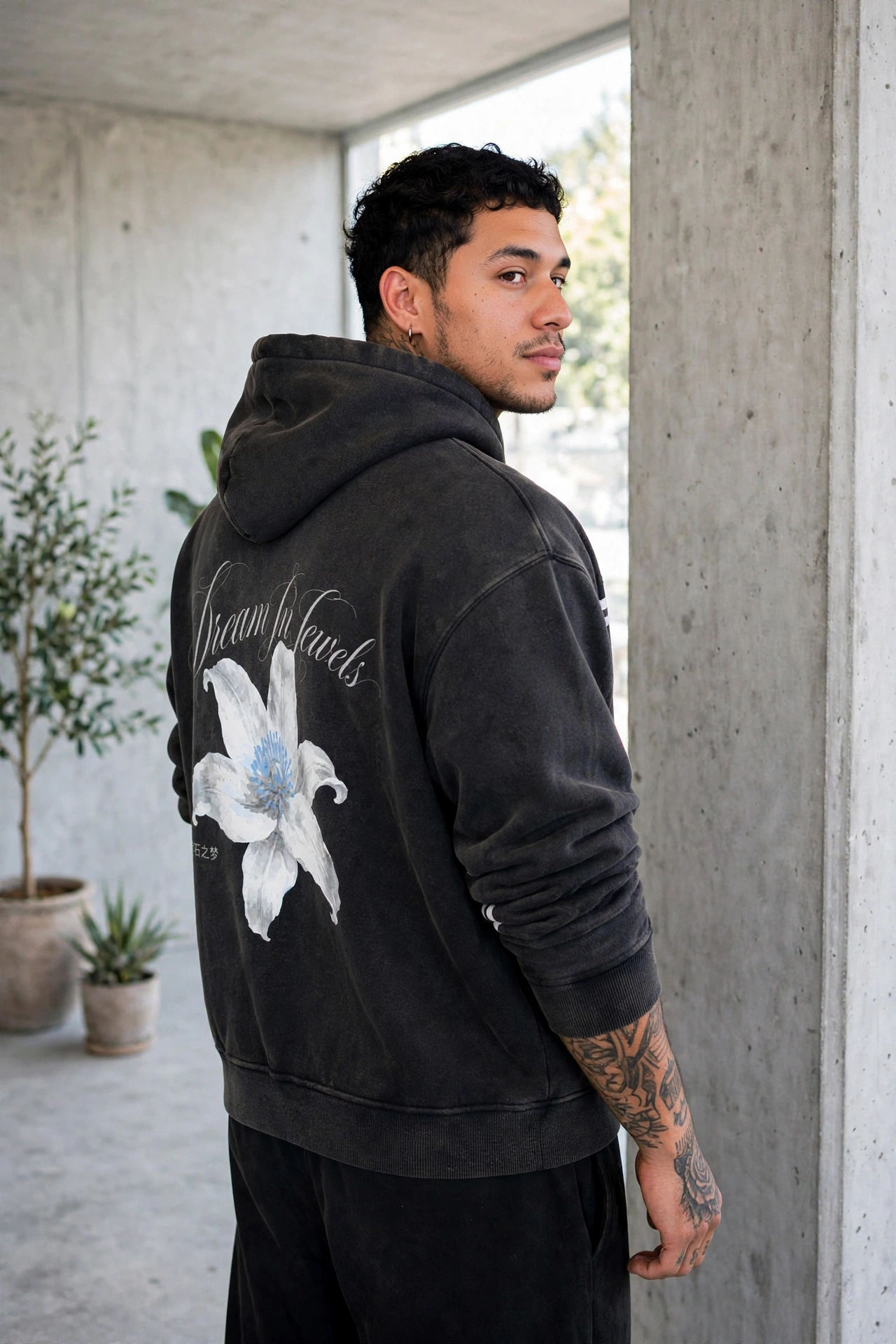 Dream In Jewels lily hoodie photographed against bare concrete